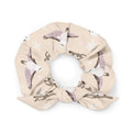 Snow Bird Scrunchie with a festive bird design, perfect for stylish outfits and holiday gifting.