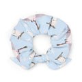 Bright and festive Snow Bird Scrunchie featuring charming birds, perfect for stylish outfits and holiday gifting.