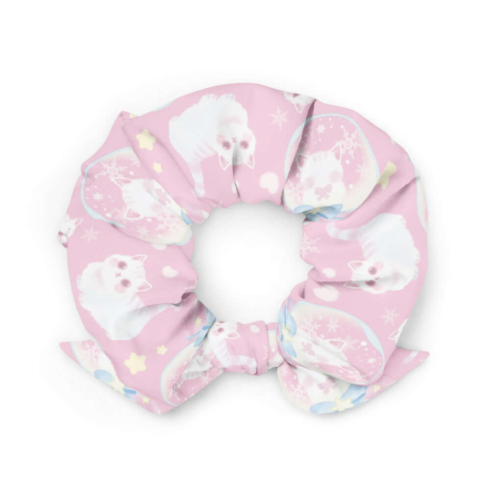 Snow Kitten Scrunchie adds a cute touch to any outfit with playful kittens on a pastel background. Perfect for any style!