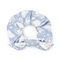 Snow Kitten Scrunchie features adorable kittens on a pastel blue background, perfect for a stylish touch to any outfit.