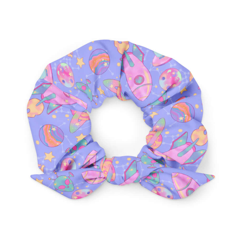 Colorful Space Scrunchie featuring vibrant planets and rockets, perfect for adding style to your outfit.