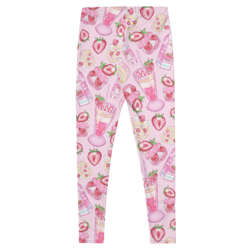 Strawberry leggings featuring a fun print of strawberries and desserts on a pink background, perfect for any strawberry lover.