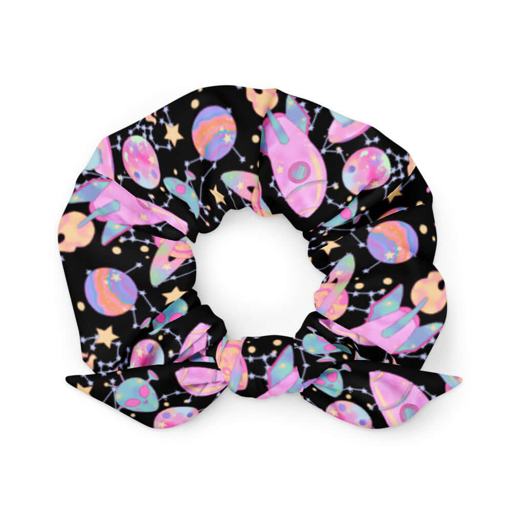 Trendy Space Scrunchie featuring vibrant planets and rockets, perfect for stylish hair protection and outfit enhancement.